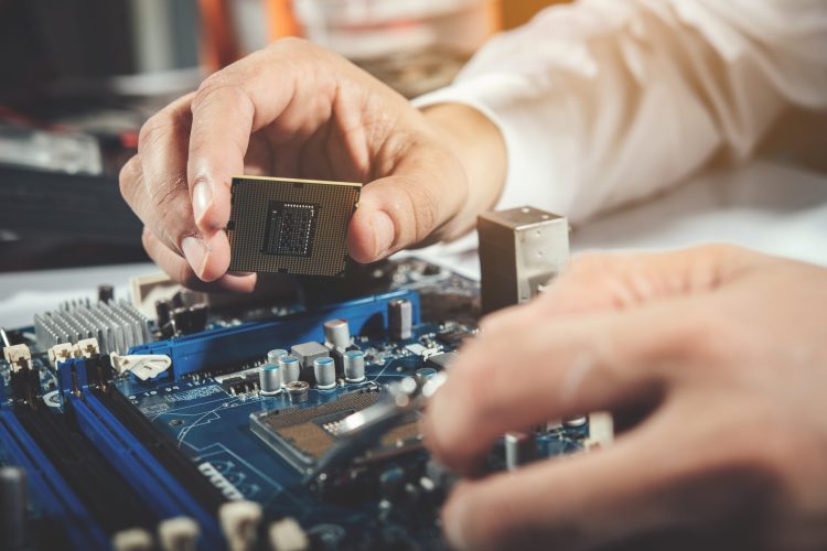 The technician repairing the computer,computer hardware, repairi The technician repairing the computer,computer hardware, repairing, upgrade and technology